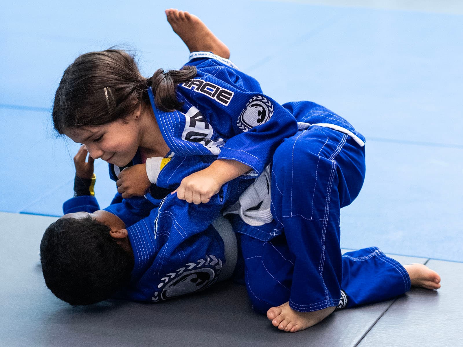 Two children practicing Brazilian Jiu-Jitsu in the kids class at Renzo Gracie Jiu-Jitsu Upper West Side